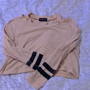 A pink crop top long sleeve.